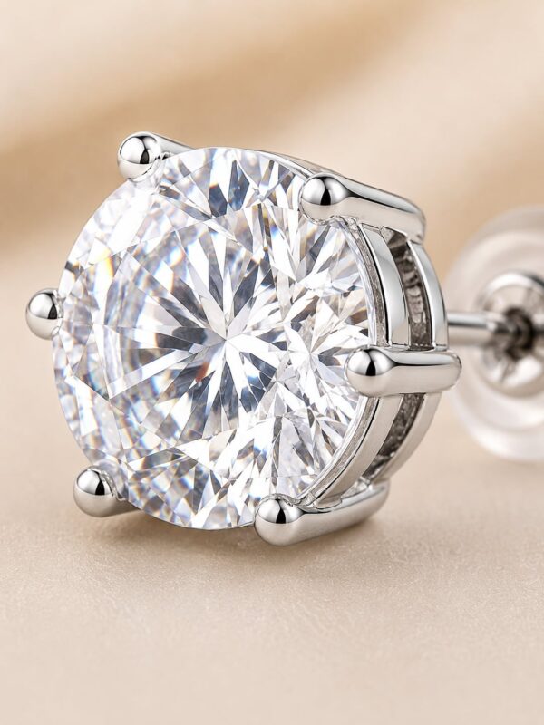 Macro close-up of an AAA round CZ solitaire in a rhodium-plated six-prong stud setting