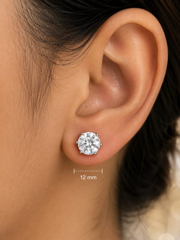 Close-up of Celeste American Diamond solitaire stud on an ear showing its 12 mm diameter