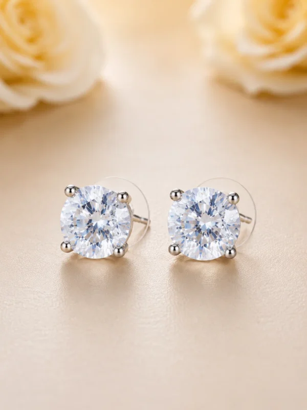 Pair of Celeste Petite 8 mm AAA American Diamond solitaire studs in four-prong silver-toned settings