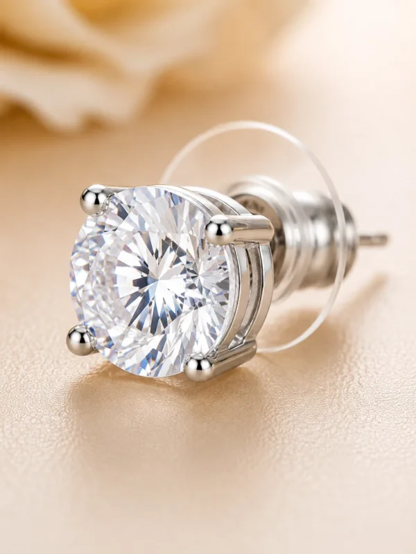 Macro close-up of an AAA round CZ solitaire in a rhodium-plated four-prong stud setting