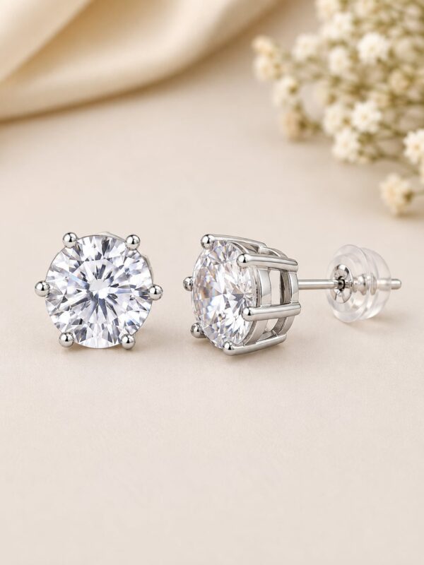 Front, side and post-back views of Celeste rhodium-plated American Diamond stud earrings