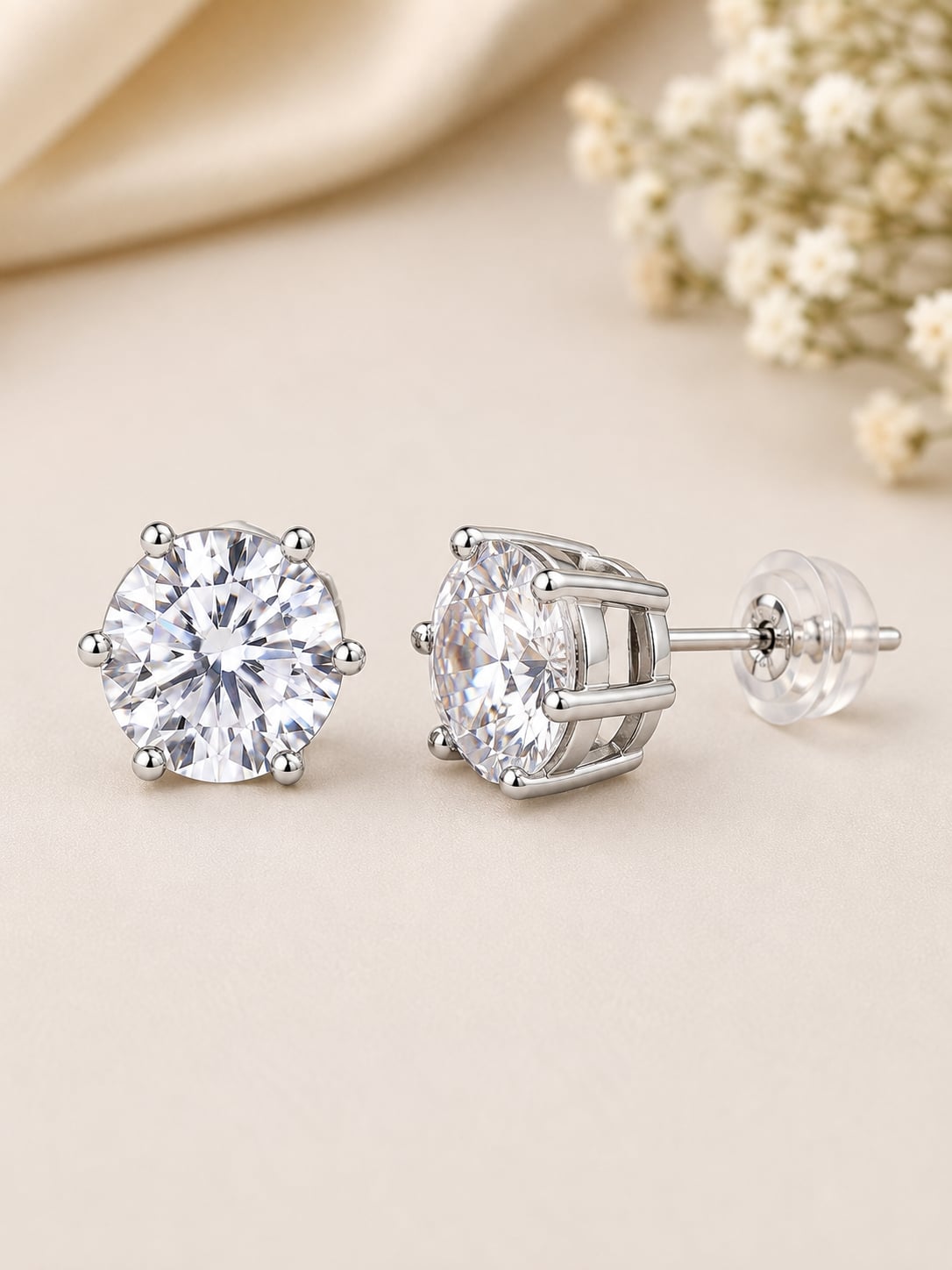 Front, side and post-back views of Celeste rhodium-plated American Diamond stud earrings