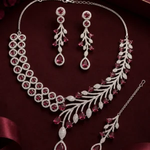 Crimson Royale American Diamond necklace set with crimson stones, matching earrings and maang tikka