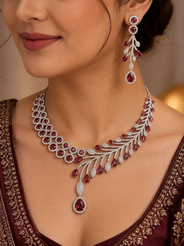 Model wearing the Crimson Royale American Diamond necklace and matching crimson drop earrings