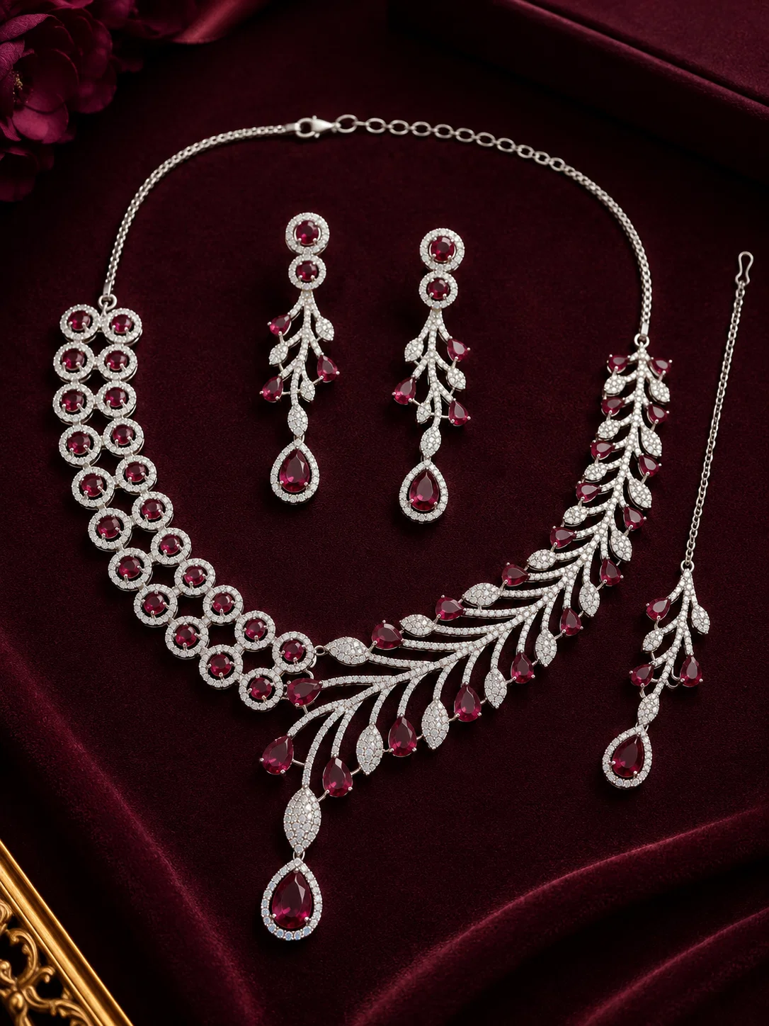 Rhodium-plated Crimson Royale AD jewellery set displayed with necklace, earrings and maang tikka